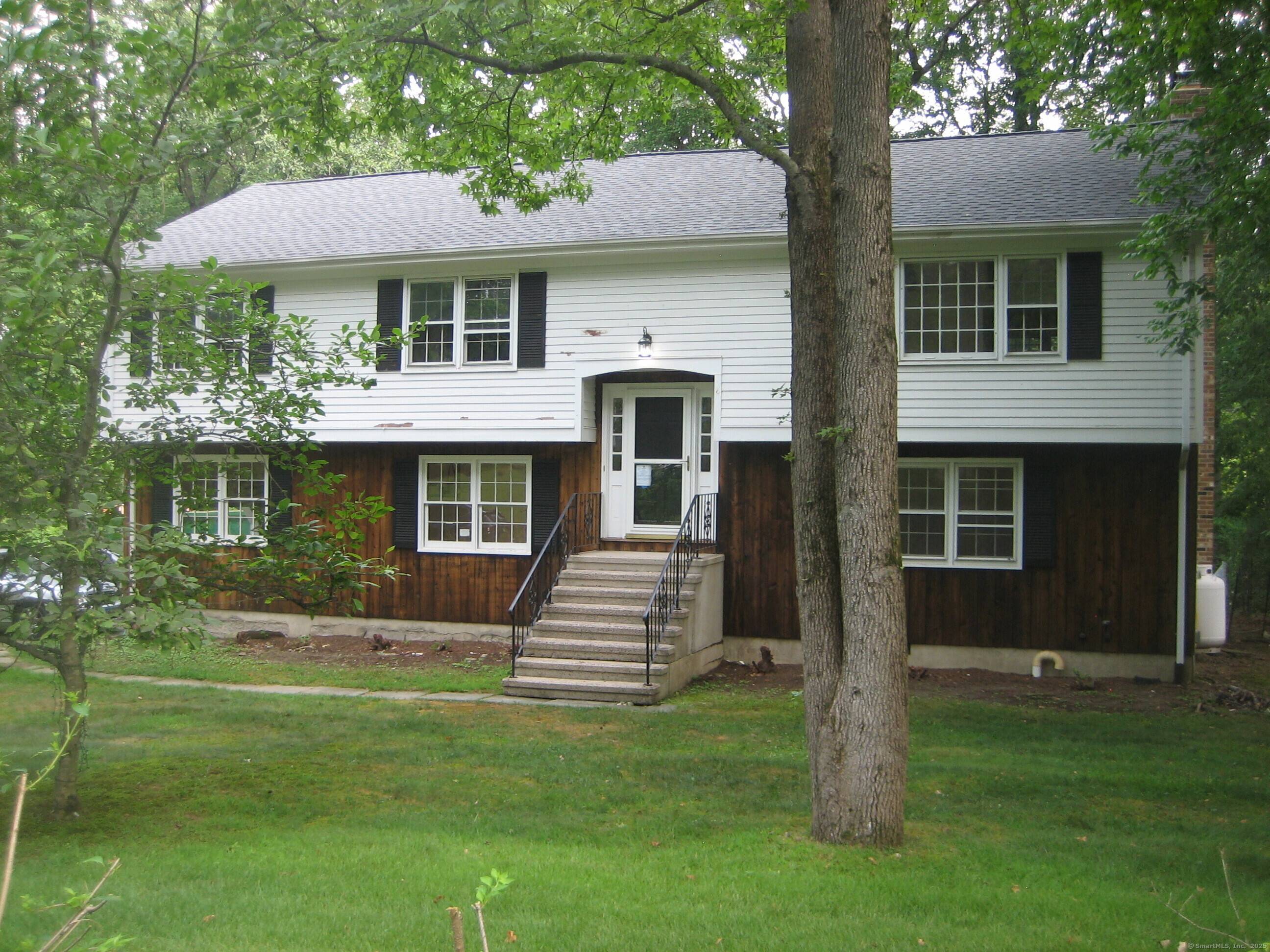 Spacious raised ranch style home with newly installed kitchen and baths.