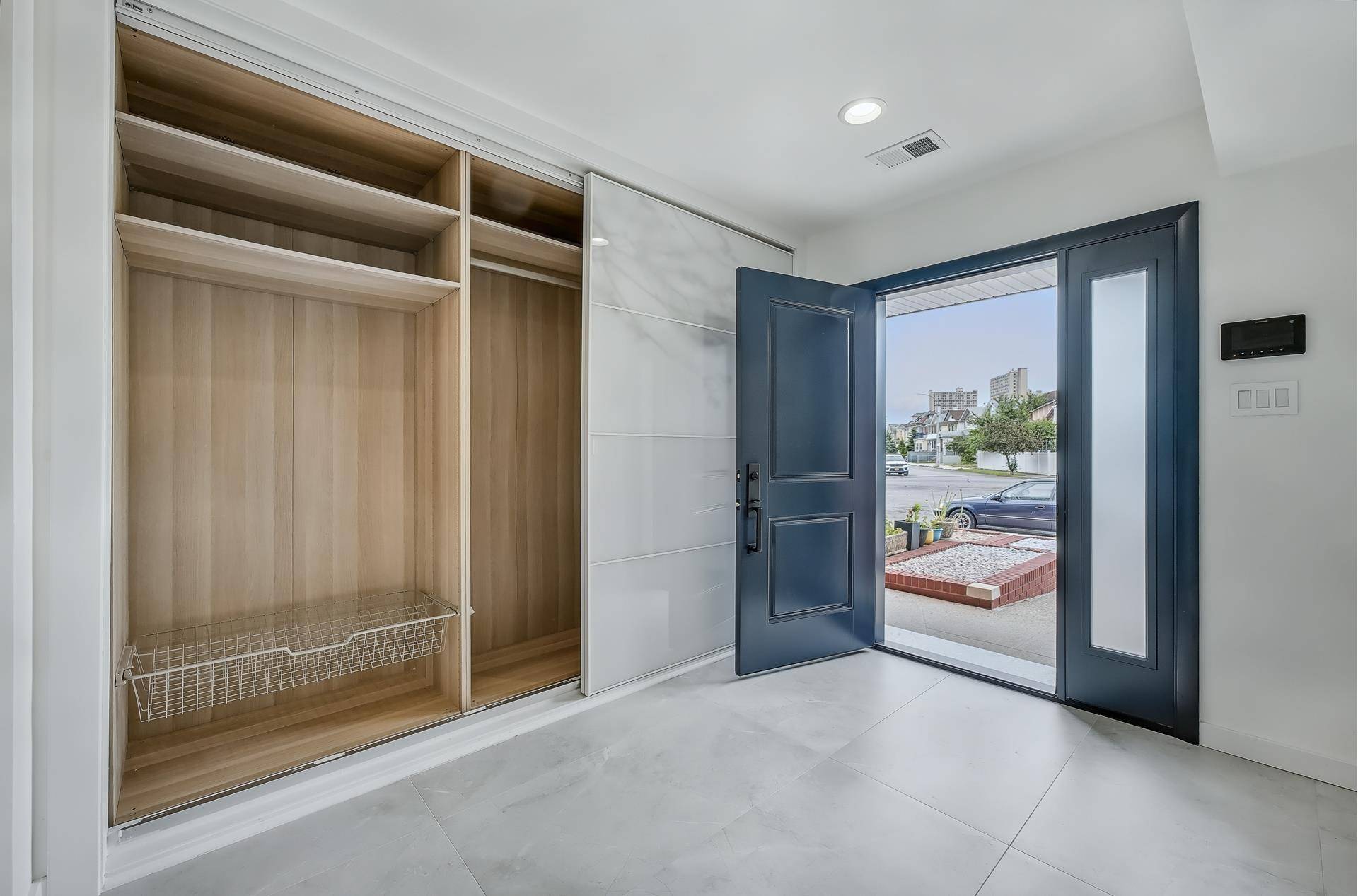 Welcome to a beautifully reimagined home in Brooklyn's exclusive, gated Seagate community.