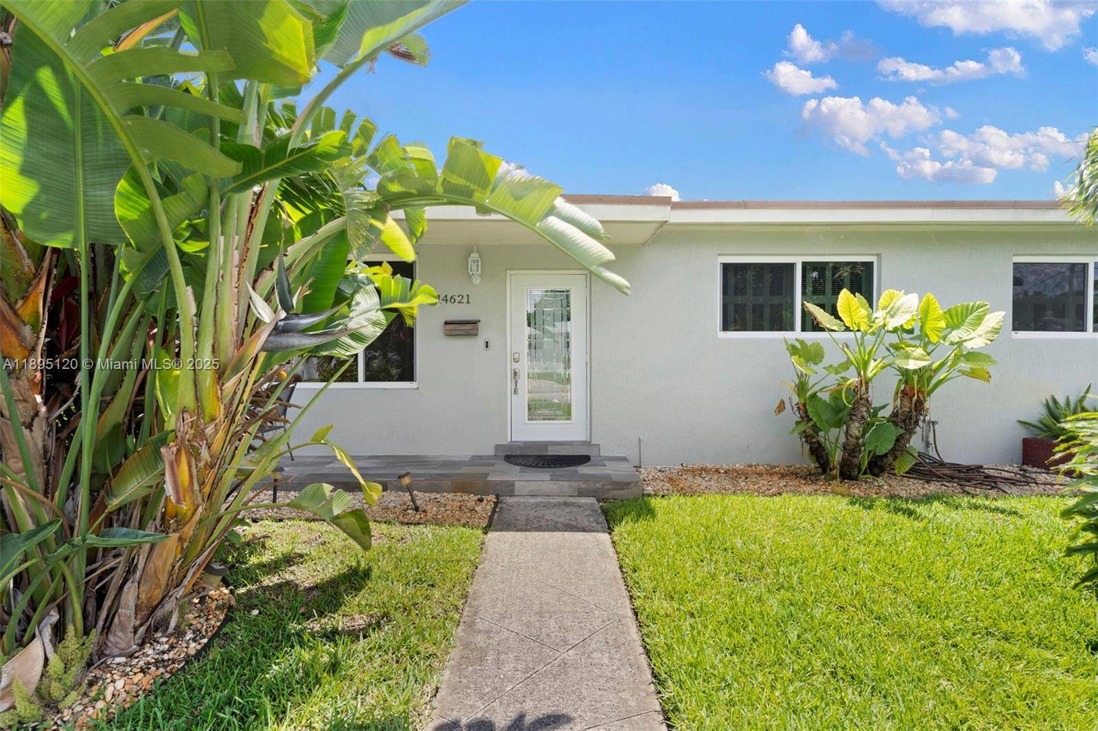 Spacious single family home featuring 3 bedrooms, 2 full baths, a large fenced yard with fruit trees, a screened in porch, and a 2 car garage.