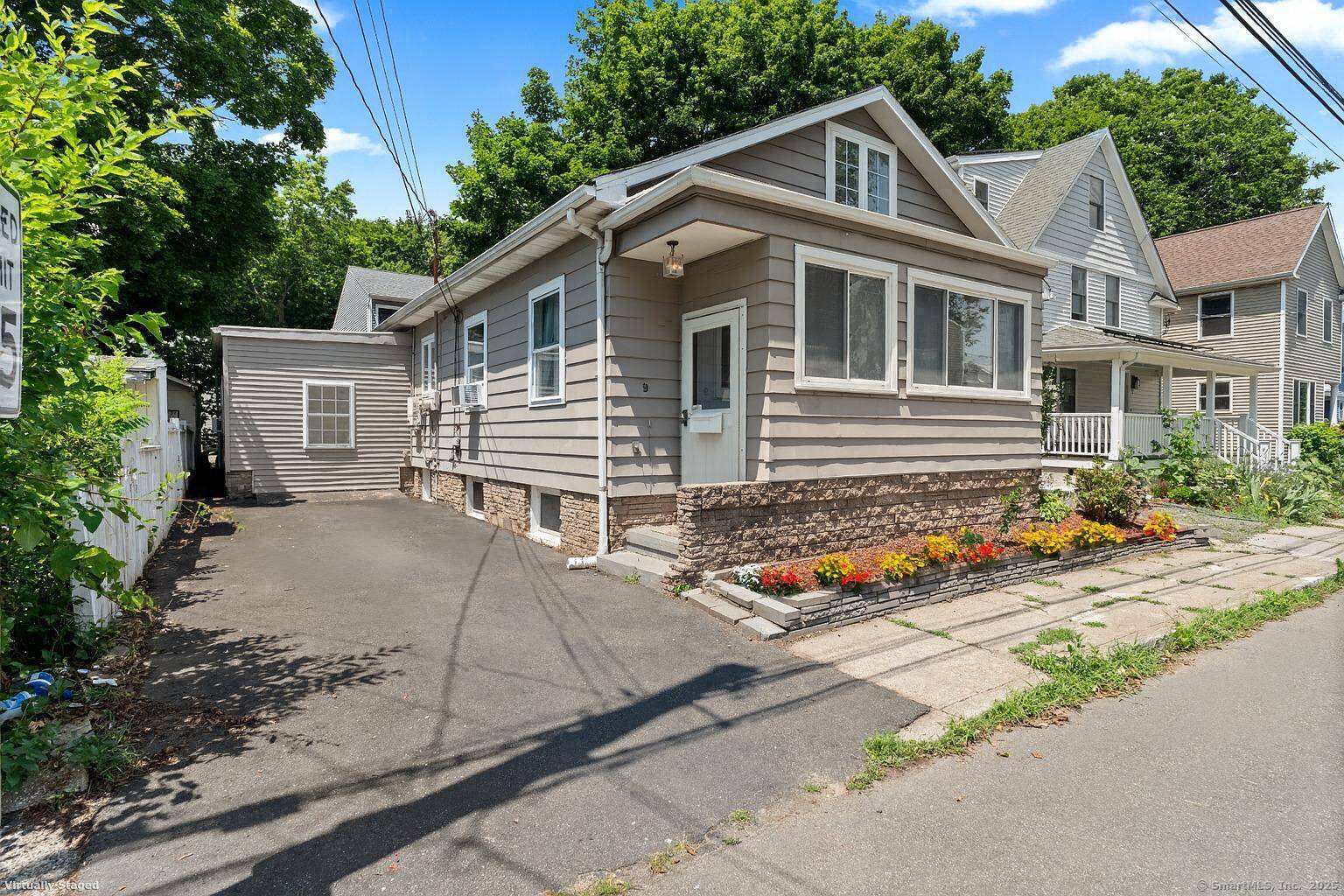 Tucked into one of Milford's most beloved coastal neighborhoods, this updated bungalow offers comfort, flexibility, and an unbeatable location just a short stroll to Fort Trumbull Beach.