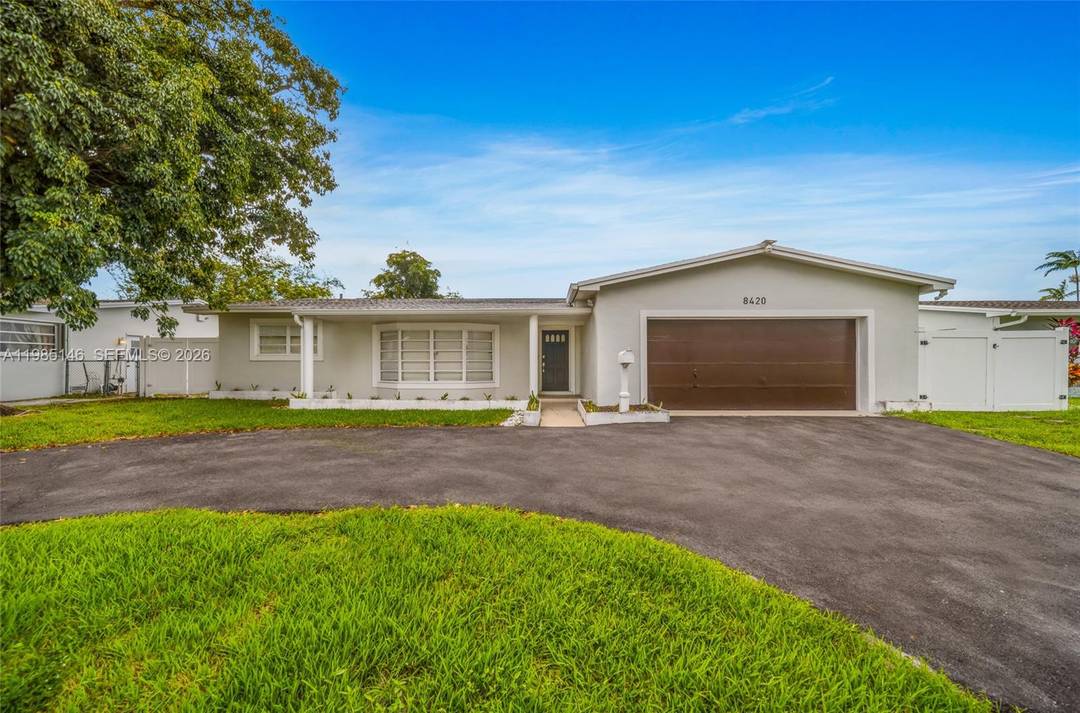 Beautiful lakefront pool home in a highly desirable neighborhood, offering space, privacy, and a flexible layout suited for a variety of living arrangements.