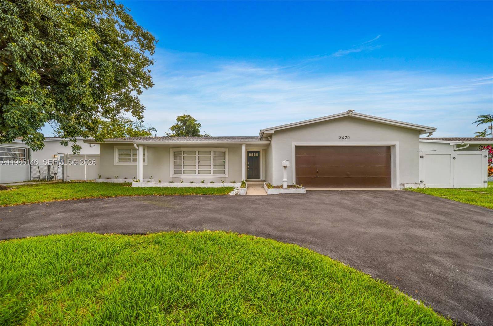 Beautiful lakefront pool home in a highly desirable neighborhood, offering space, privacy, and a flexible layout suited for a variety of living arrangements.