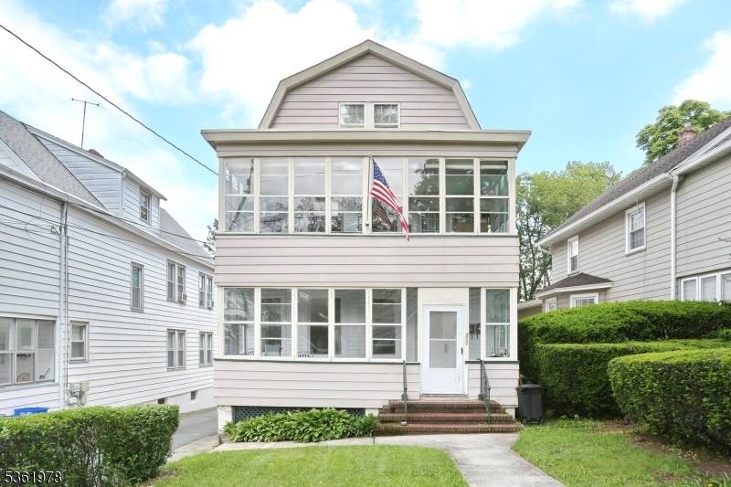 Welcome to this large two family home offering versatility and comfort for both owners and tenants.