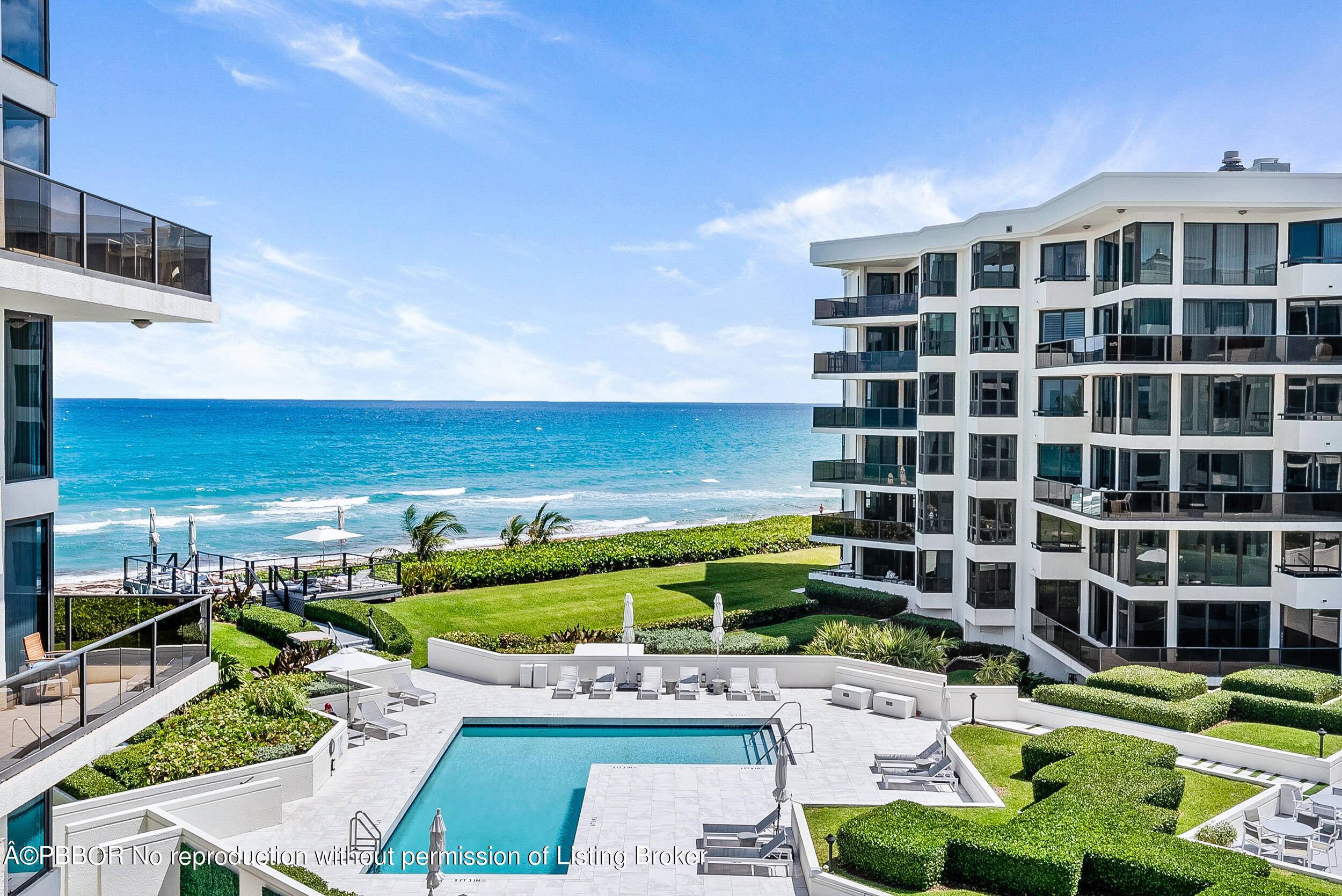 Designer oceanfront condo located on a wide sandy beach in South Palm Beach.