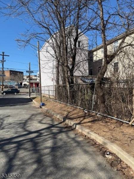 Attention Investors ! Prime Opportunity with Approved Plans for a Two family Conversion.