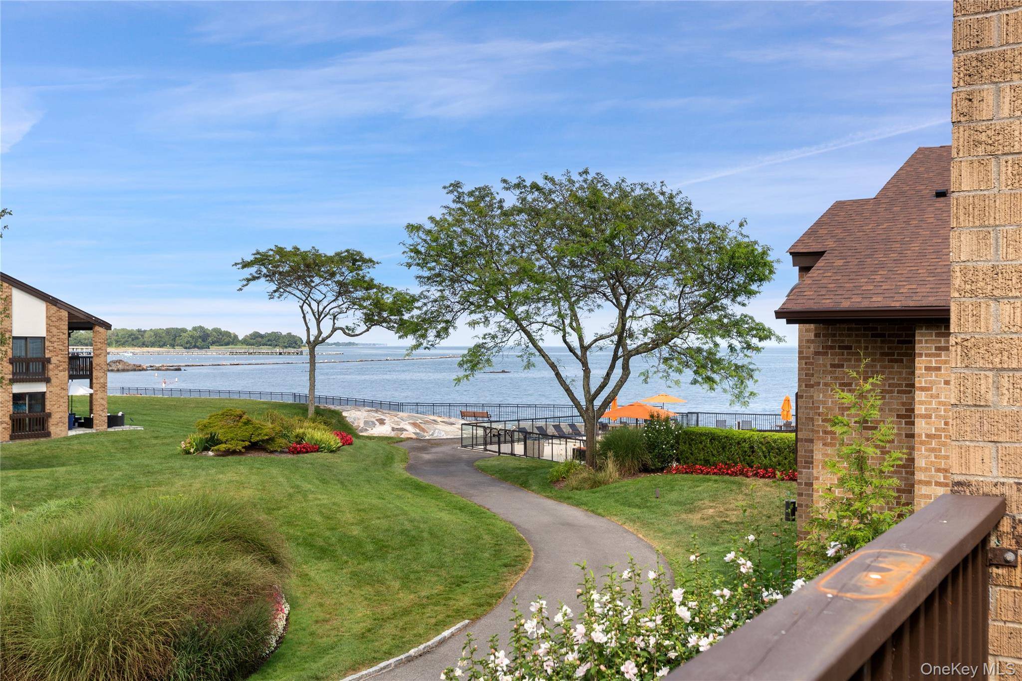 WATERVIEWS ! Welcome to this sun drenched, two bedroom, two bath condo at Water s Edge on the Long Island Sound in Rye, NY.