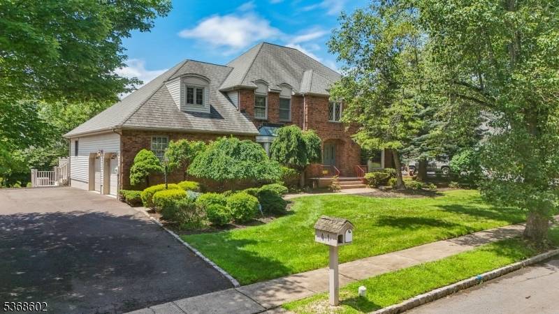Welcome to this stunning Colonial home in one of East Hanover's most peaceful and sought after neighborhoods.