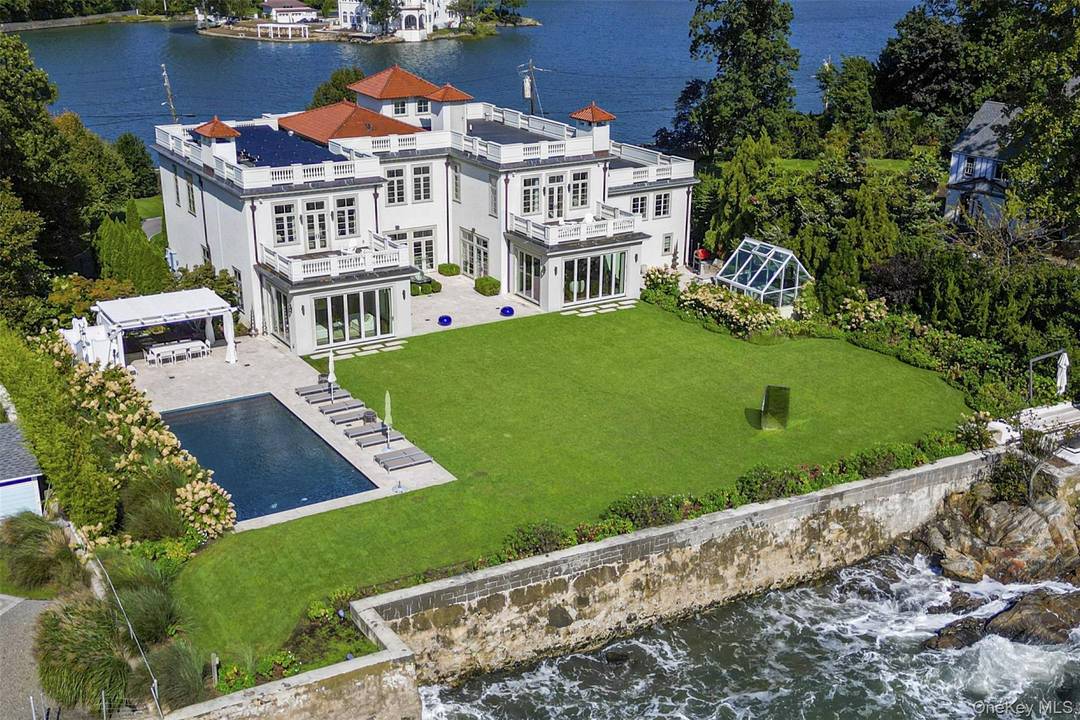 A rare and distinguished waterfront offering, located just 30 minutes from Manhattan, set within the exclusive, gated enclave of Premium Point.