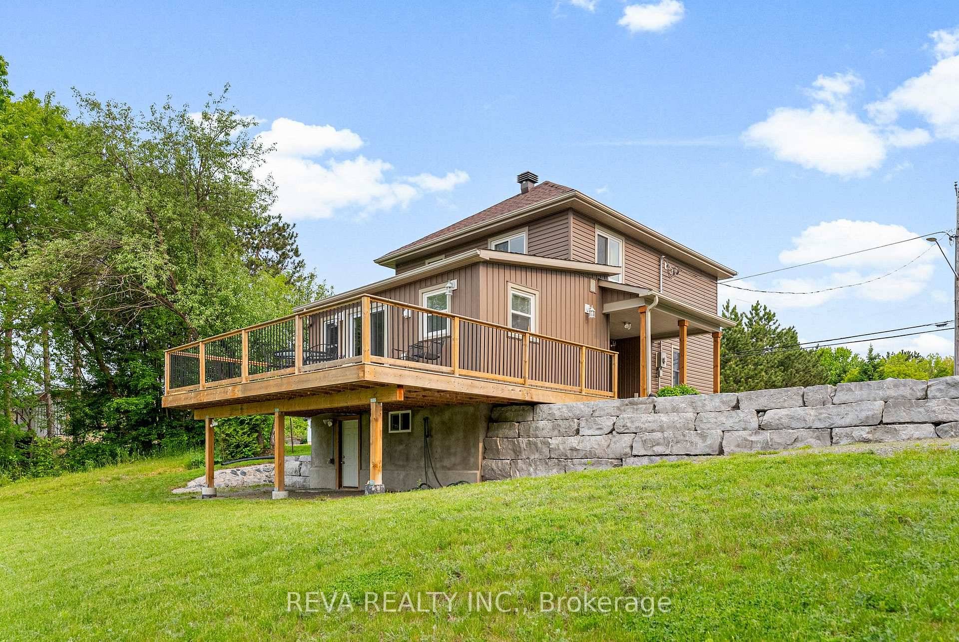 Discover the perfect blend of lakeside tranquility and in town convenience with this beautifully renovated waterfront home on Kamaniskeg Lake in Barrys Bay.