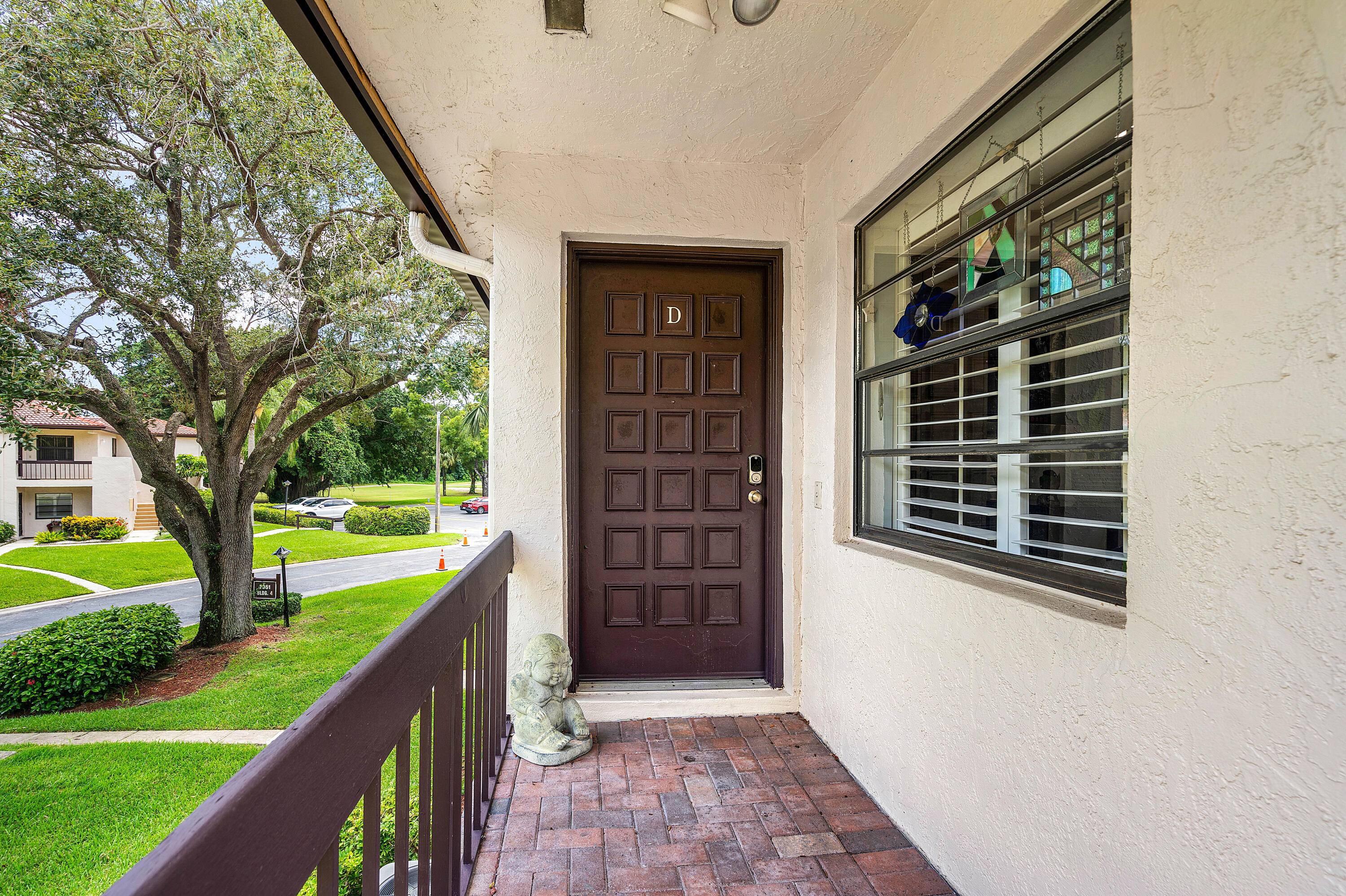 Serenity awaits in this beautiful 2 2 condo with a den located in the highly sought after 55 Boca Lago golf community.