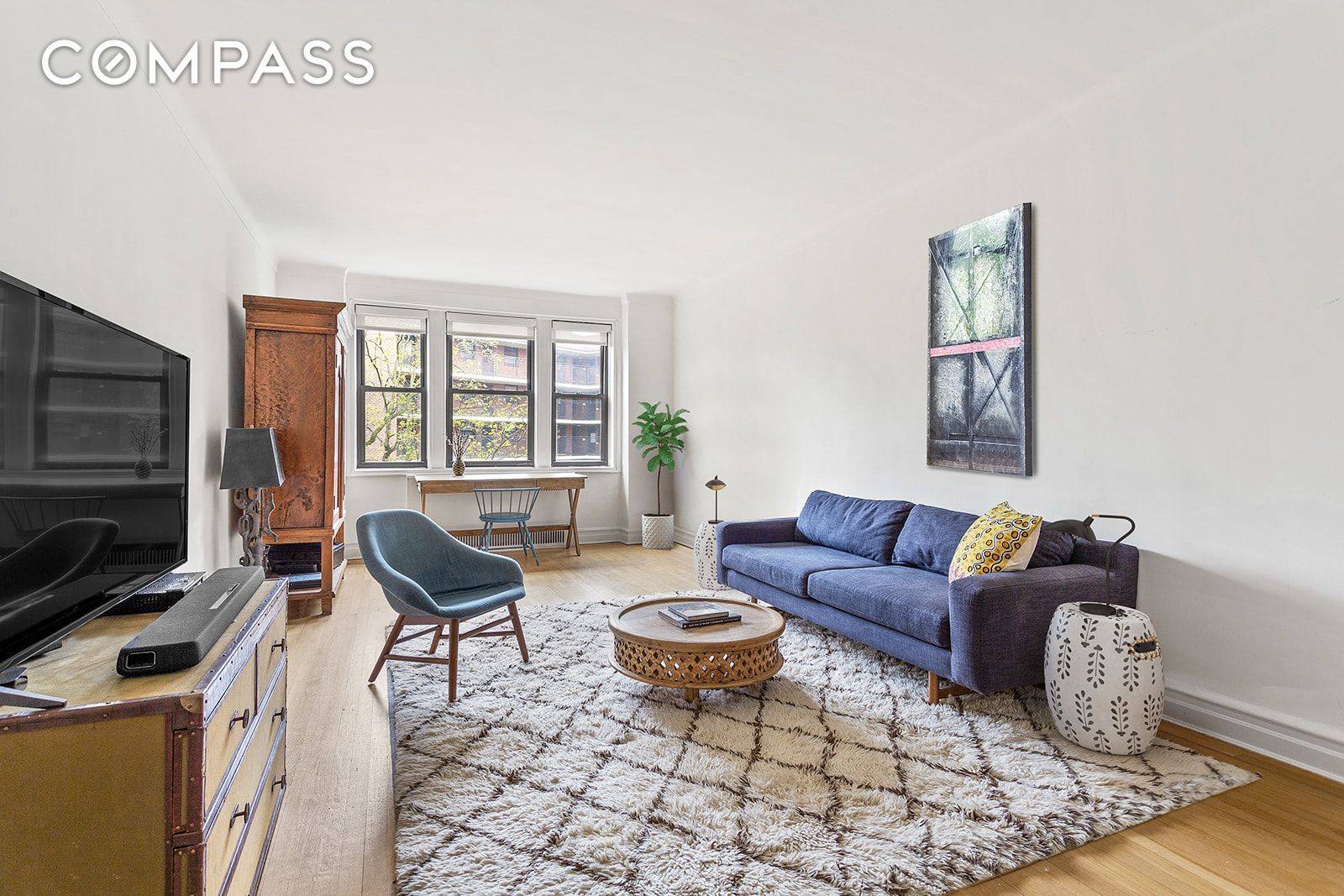 Light, sky, and views abound in this beautiful top floor, corner unit at the sought after Belvedere East.