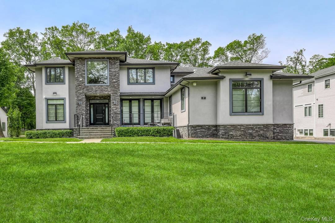 Move right into this spectacular, newly built custom colonial offering over 7, 000 square feet of luxurious living space, including a 2, 490 sqft walkout basement.