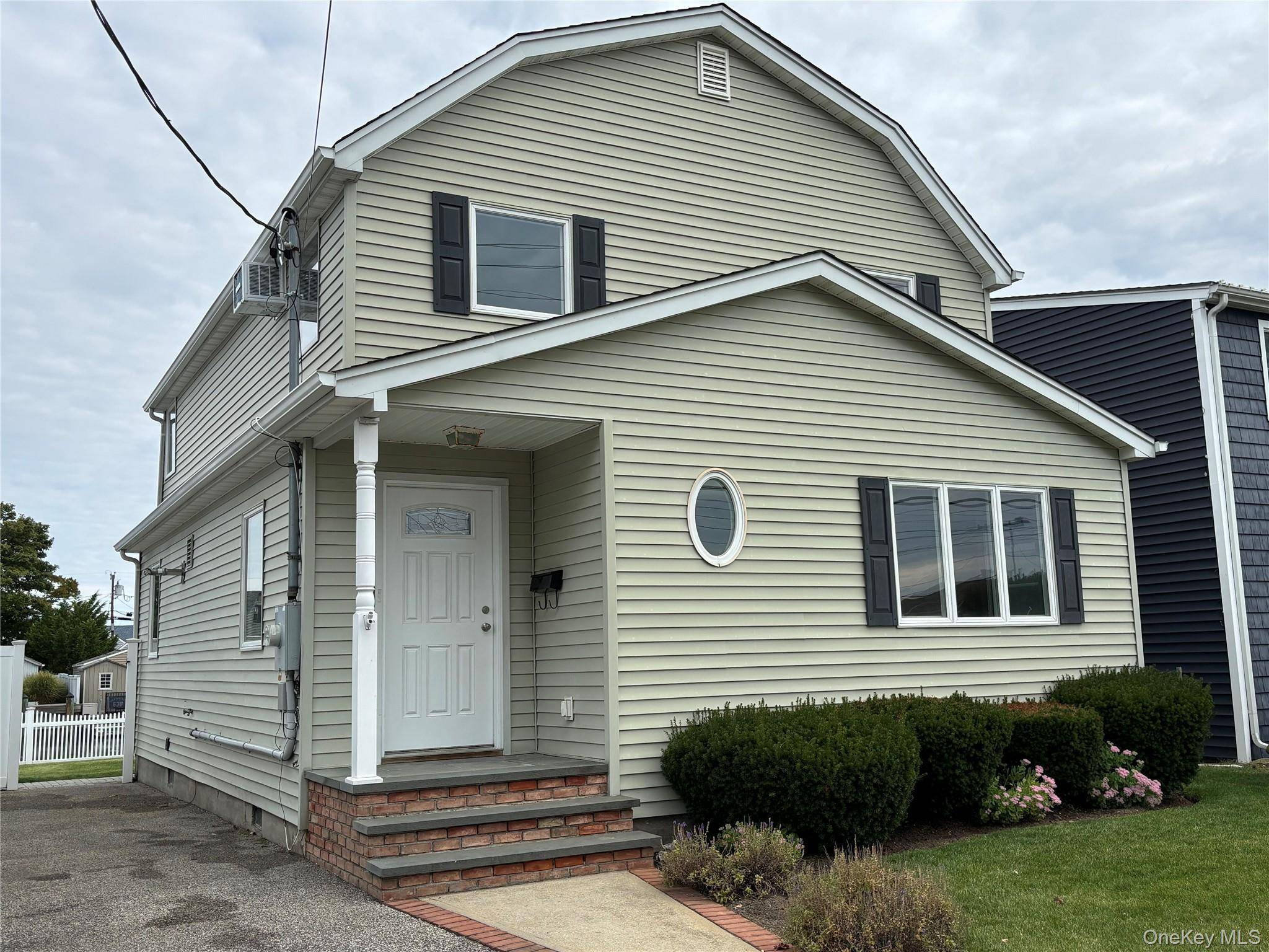 Beautiful completely remodeled Waterfront Colonial.