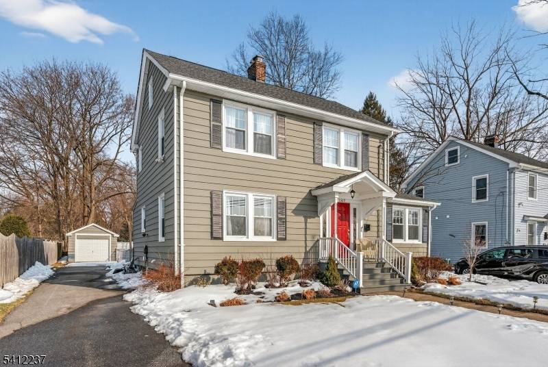 Welcome to this fabulous three bedroom, two bath Colonial style home located on a desirable tree lined street.