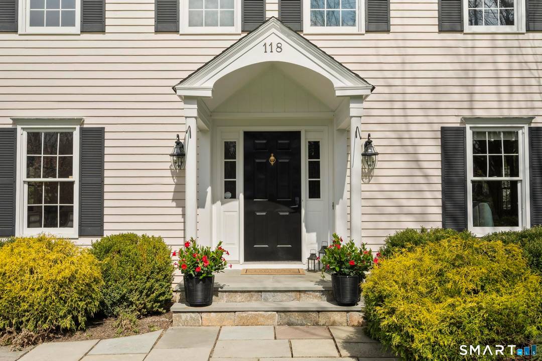 Refined Silver Spring colonial offering rare 4 bath functionality, expansive living space, private grounds, and seamless room flow for modern family life.