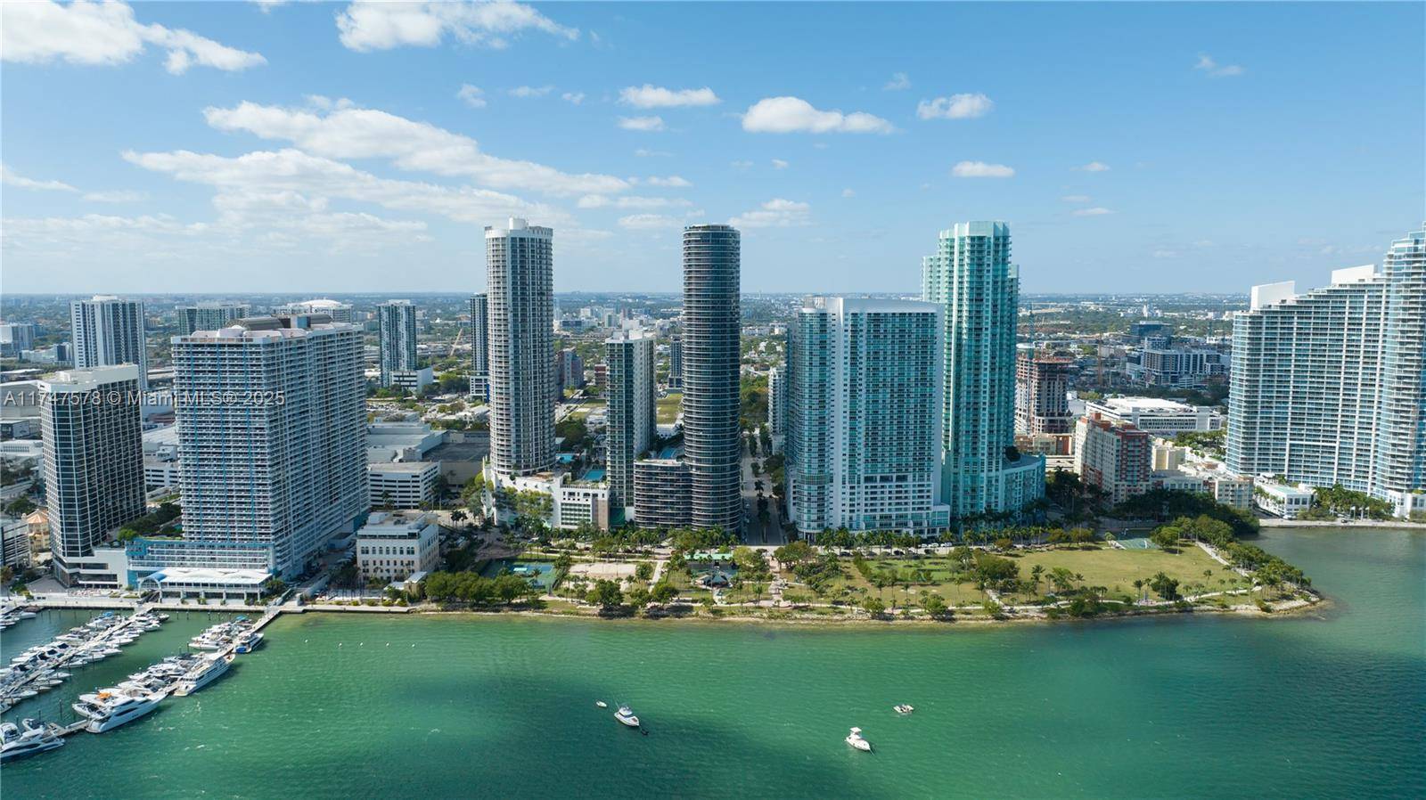 Welcome to Aria on the Bay, a masterpiece of modern design by Arquitectonica, nestled in the heart of Edgewater.