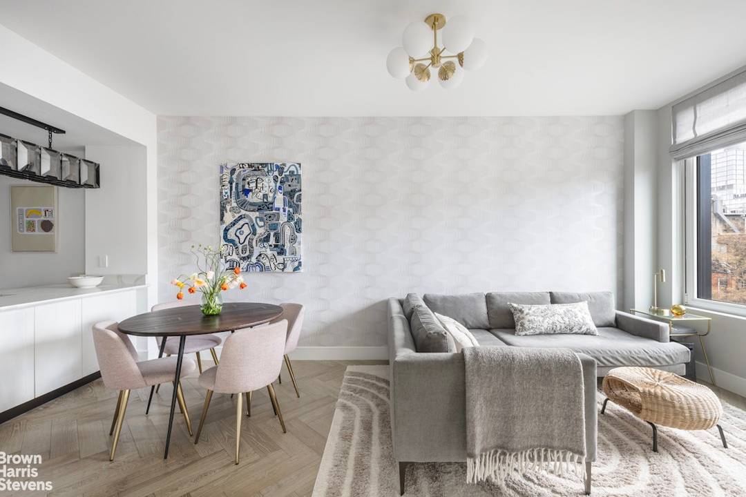 A 1 BR Den at 101 East 2nd Residence 5D is a sophisticated one bedroom with a separate home office den, and one and a half bathrooms.