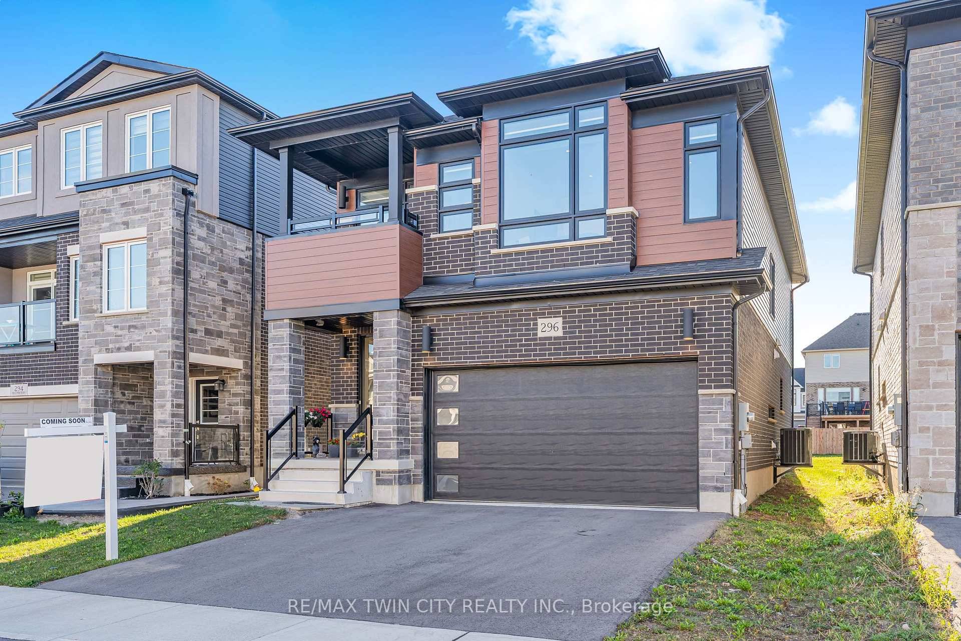 A PROPERTY WITH A CLASS OF ITS OWN Welcome to 296 Raspberry Place, Waterloo.