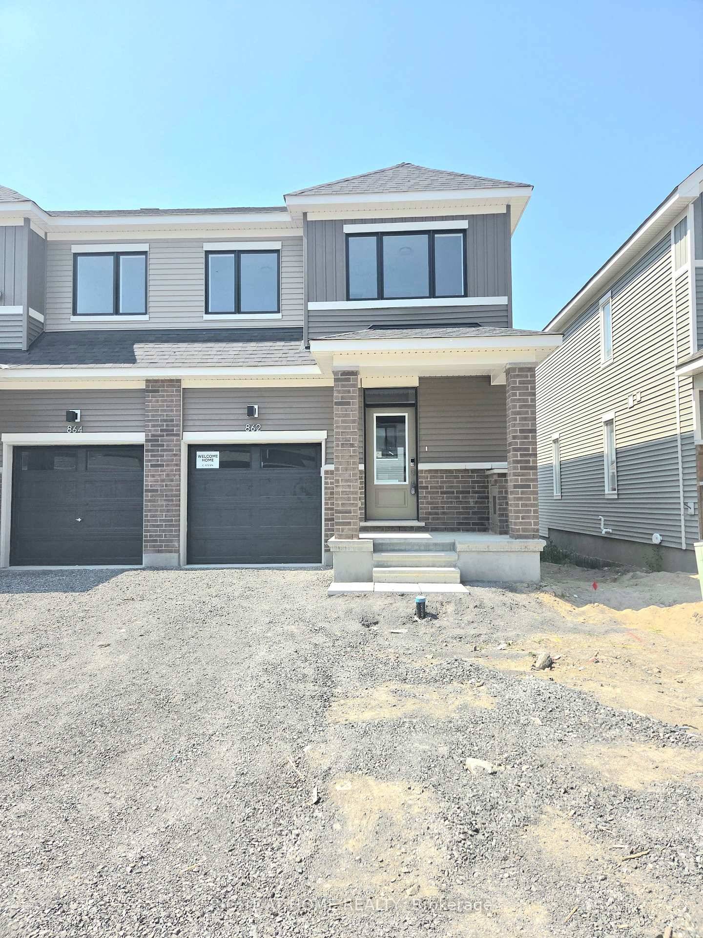 Welcome to this beautifully upgraded end unit 4 bedroom, 3 bathroom townhome, perfectly located on a quiet street in the sought after Half Moon Bay community.