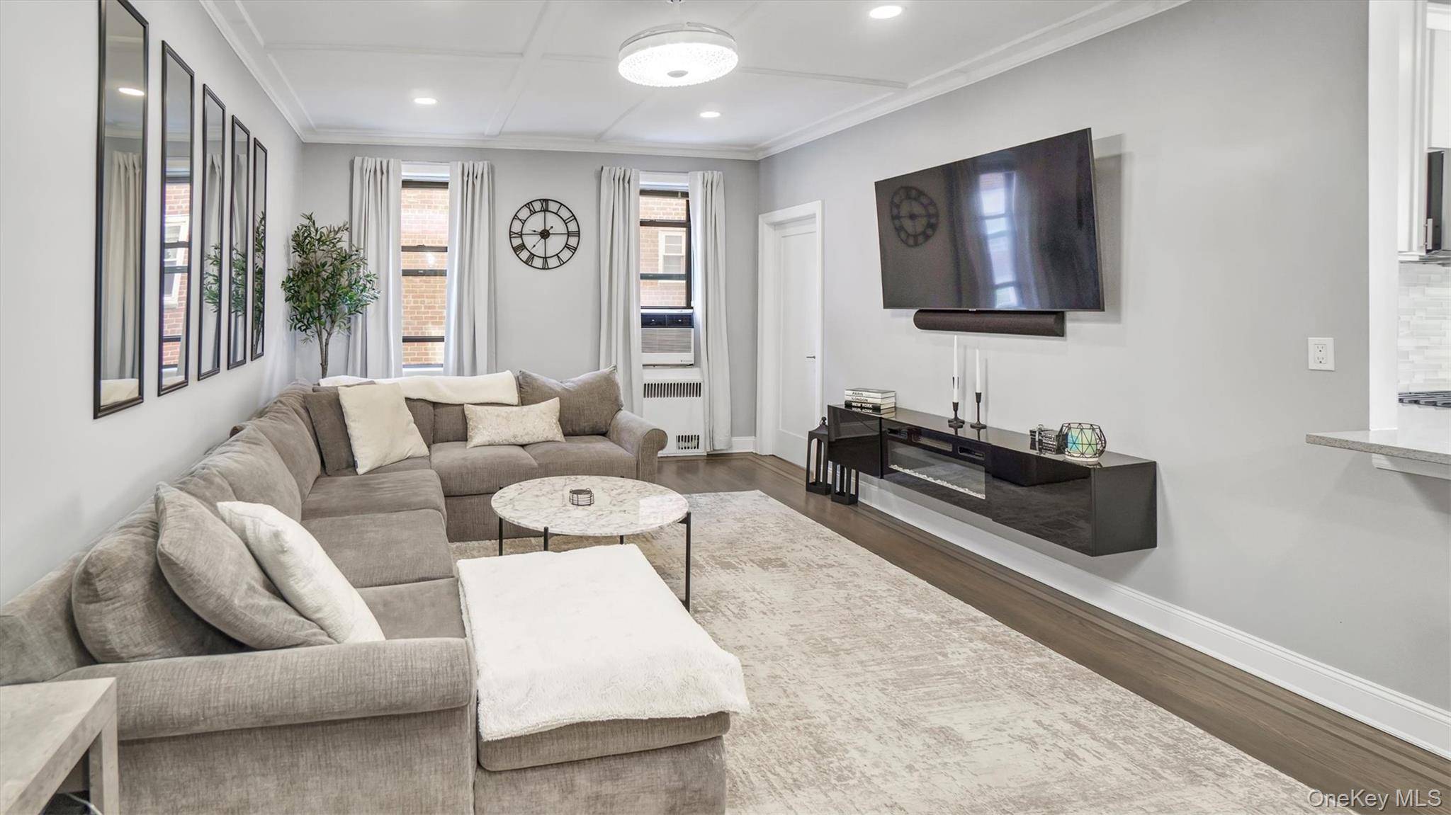 Set within the distinguished WINDSOR COOP in Great Neck Plaza, this fully renovated 1 Bedroom 1 Bath home offers a masterful blend of classic architectural elegance and contemporary design.