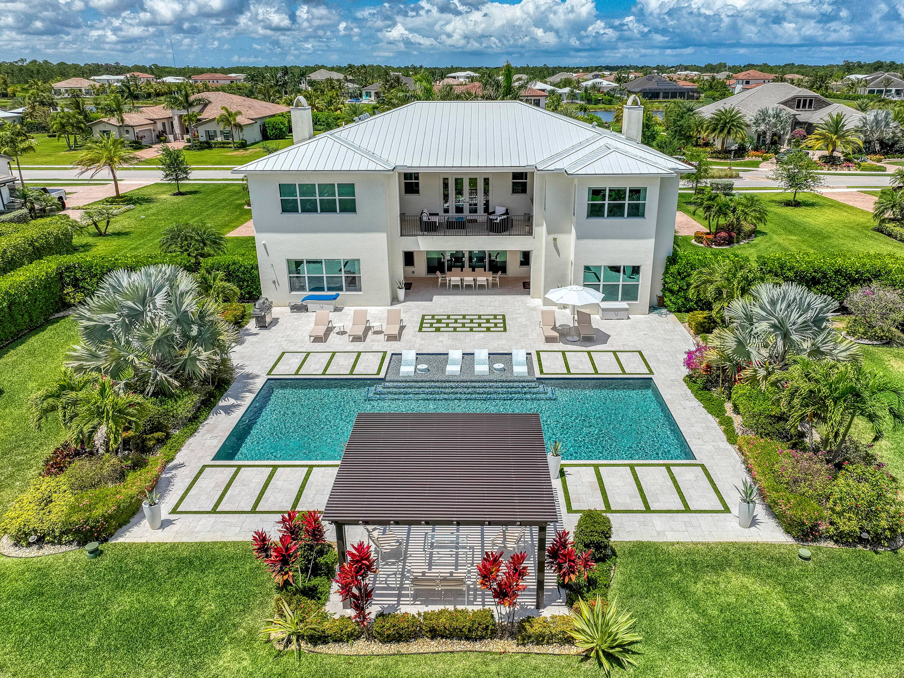 Welcome to the epitome of luxury living in the exclusive gated community of Prado Jupiter.