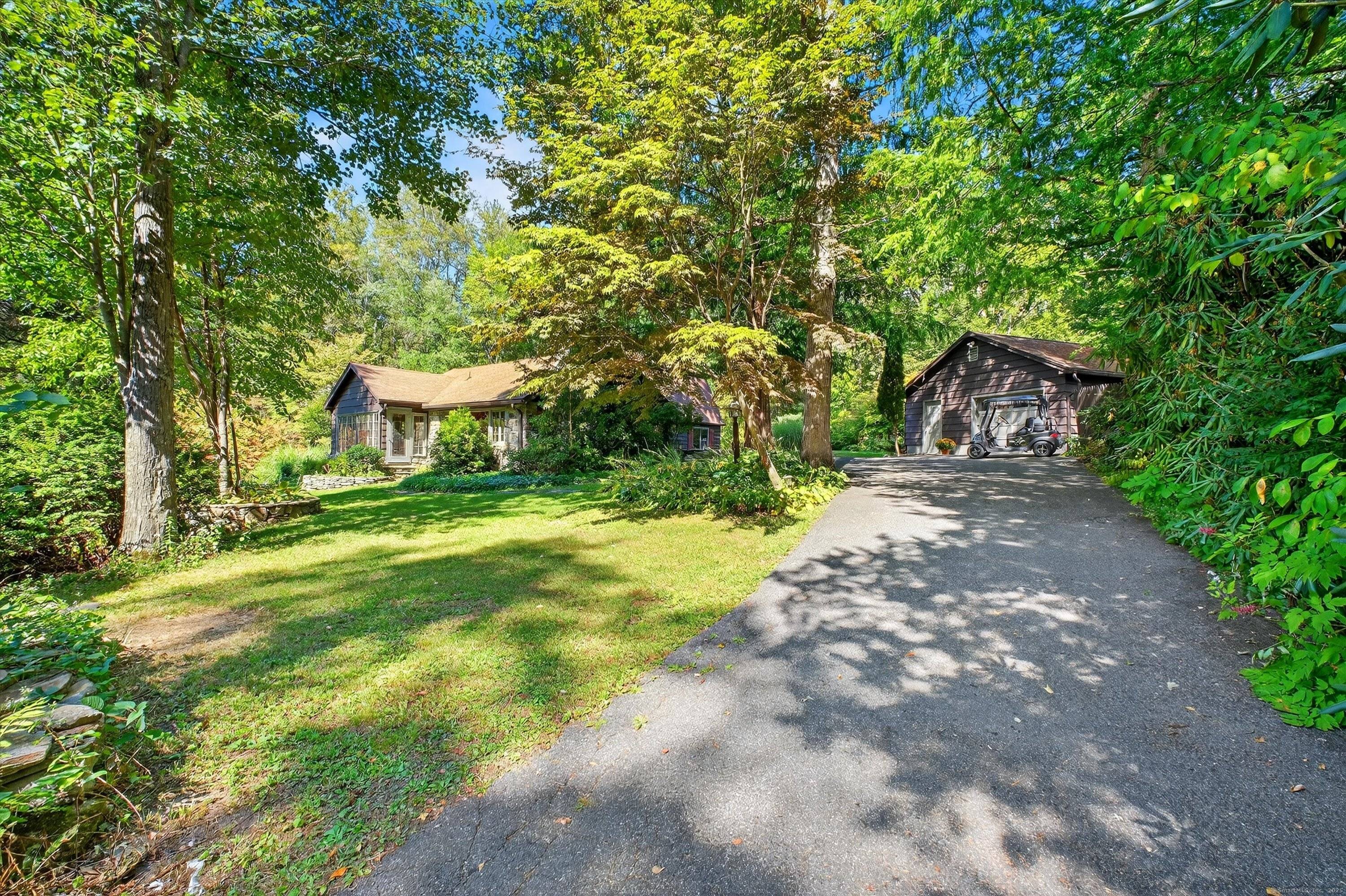Quintessential lake home in the highly sought after Candlewood Lake Club !