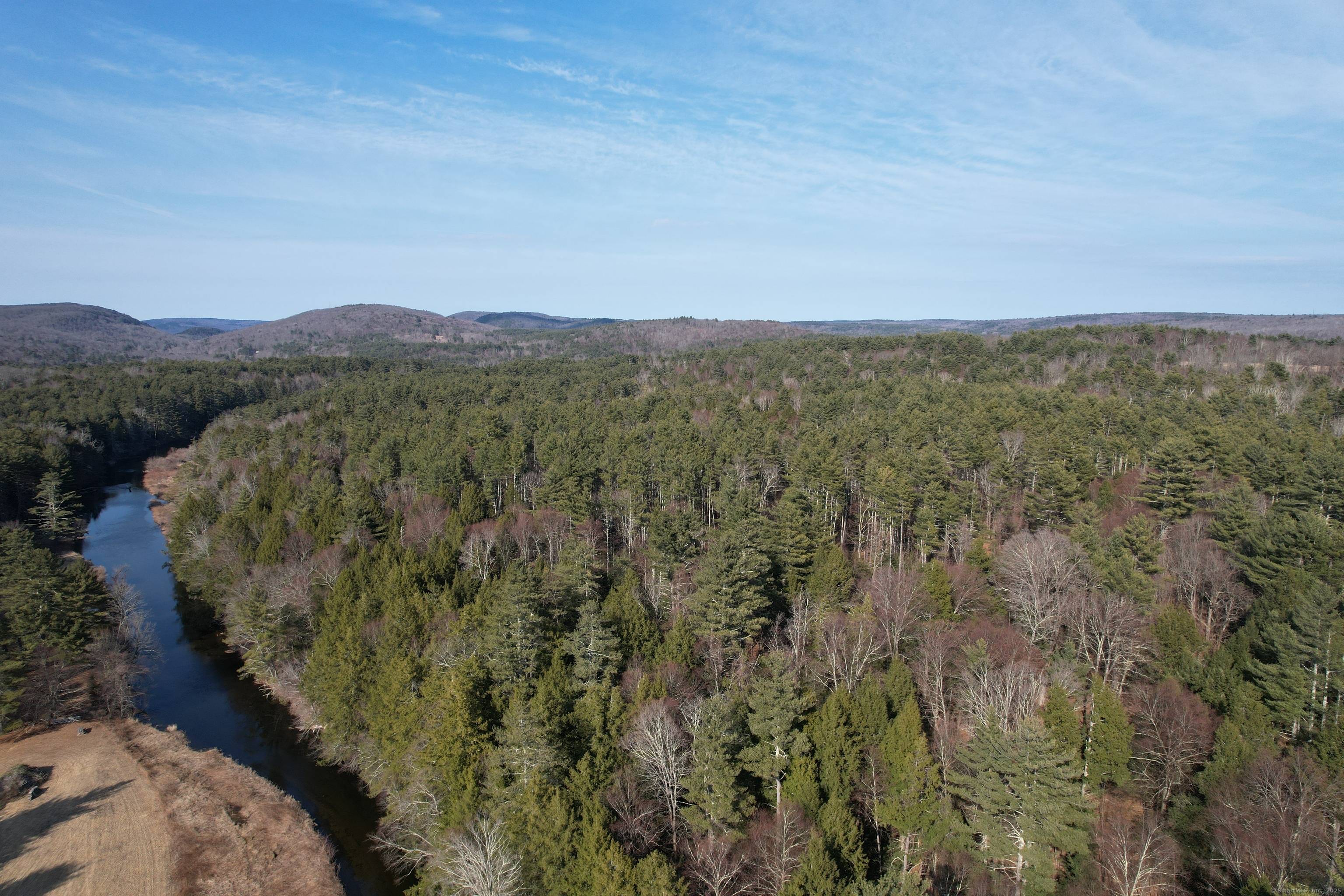 Nestled along a peaceful country road near the Colebrook and Barkhamsted town lines, this breathtaking 93.