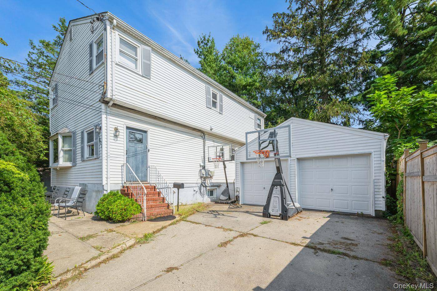 Welcome to this beautifully renovated colonial offering the perfect blend of modern luxury and classic design.