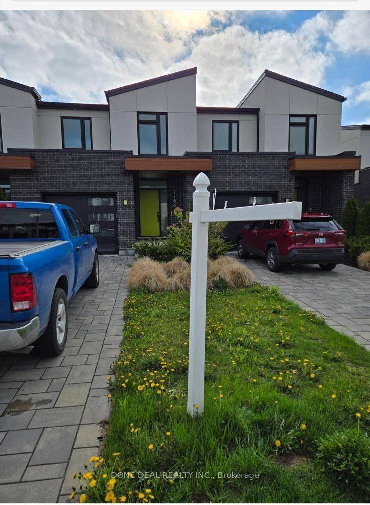 This beautifully designed townhome features a bright open concept layout with 9 ceilings on the main floor, sleek pot lights, and a modern upgraded kitchen complete with a center island ...