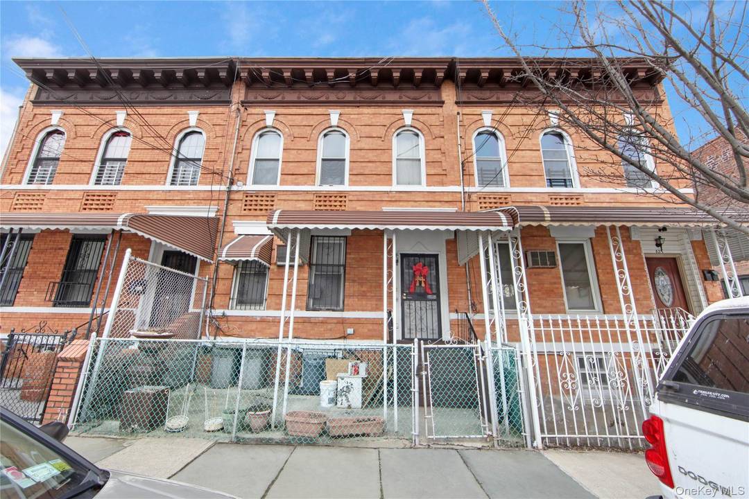 Two family brick construction in need of TLC.