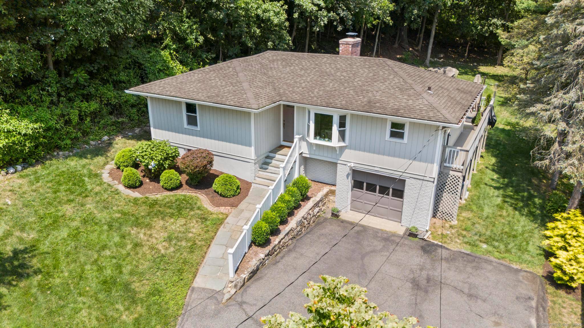 Welcome to 70 Alton Road a modern, fully updated home tucked away on a quiet, sought after street in Stamford's mid city.