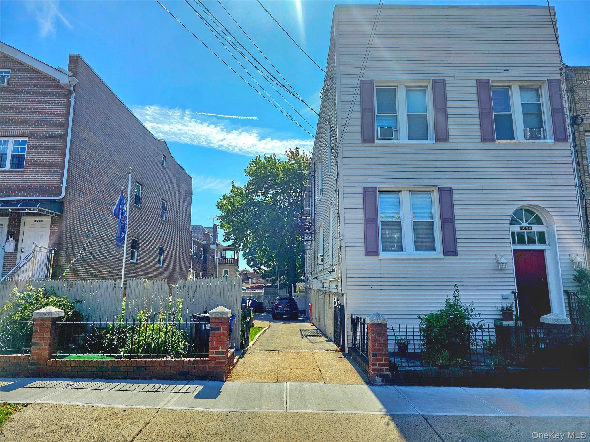 Legal 4 family in Morris Park sits on a 50x100 lot.