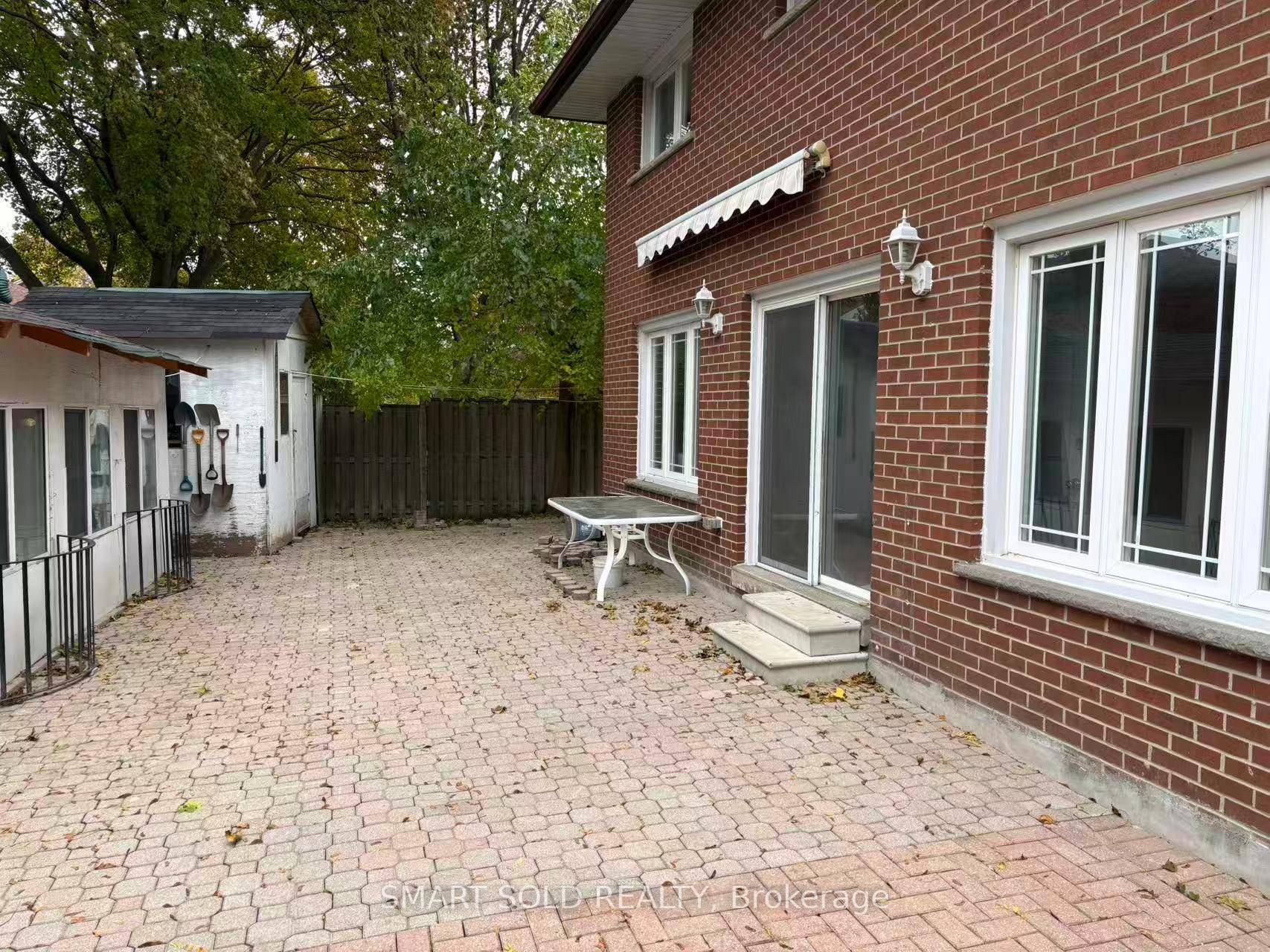 Enjoy This Beautiful First Floor apartment with large backyard and it has private entrance door.