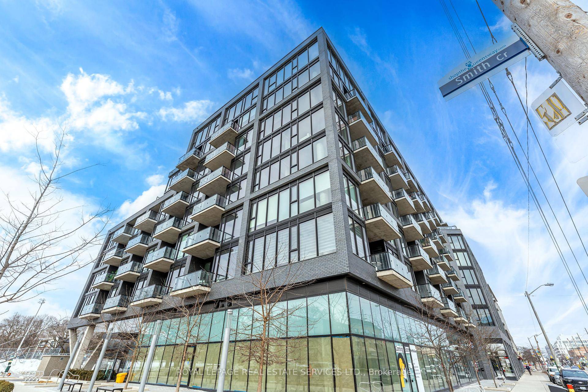 Welcome to 7 Smith Crescent, Unit 310, a modern 1 bed den in the heart of vibrant The Queensway community with sunny south exposure.