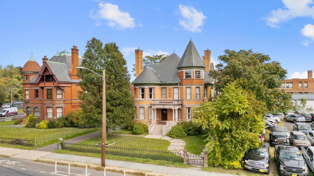 Welcome to 14 Wethersfield Avenue, an impressive mixed use 7, 188 SF brick Victorian set on a.