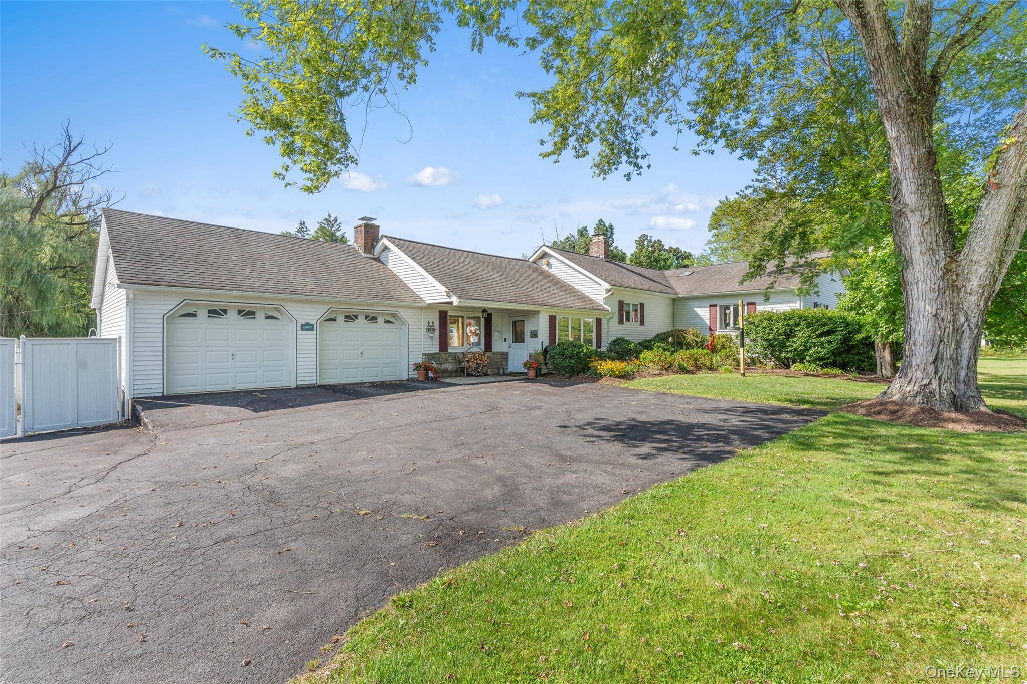 Welcome to Willow Pond, a 4 bedroom sprawling ranch with inground pool, large stocked pond, and almost 5 beautiful acres.