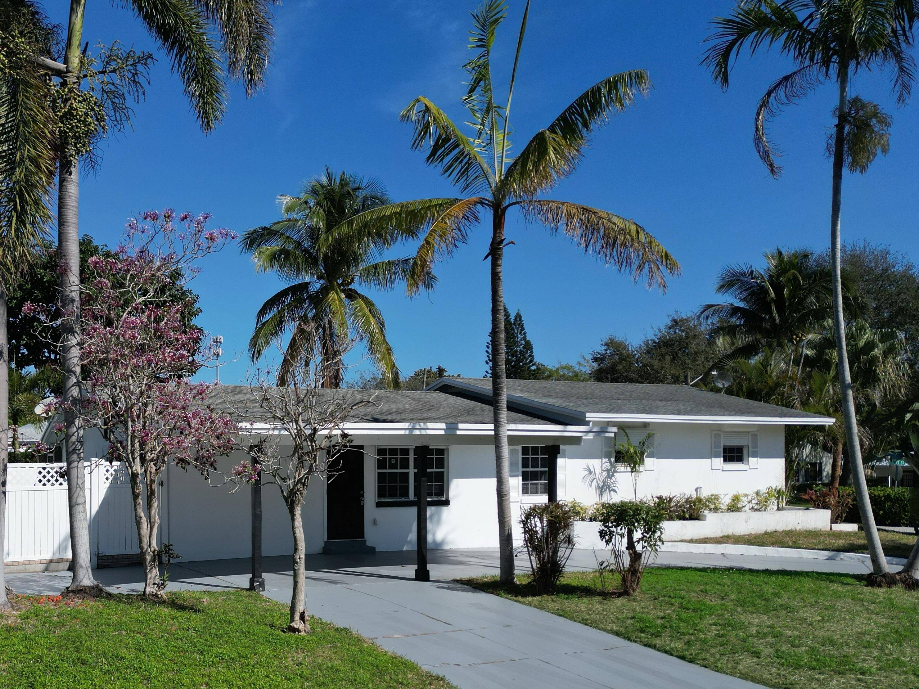 Rare East Delray Beach 4 Bedroom Home with Basement Private Oasis !