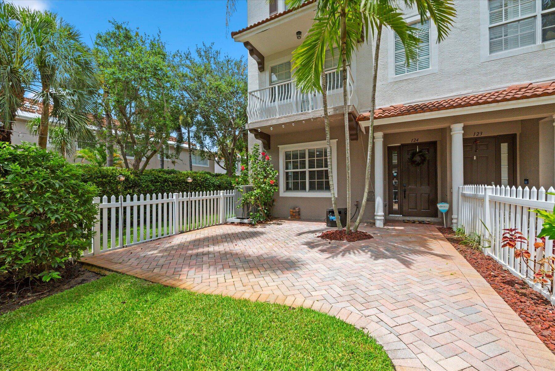 An incredible value ! Fully furnished, bright south end unit townhome in Ocean Cay, a gated intracoastal community in Hypoluxo.