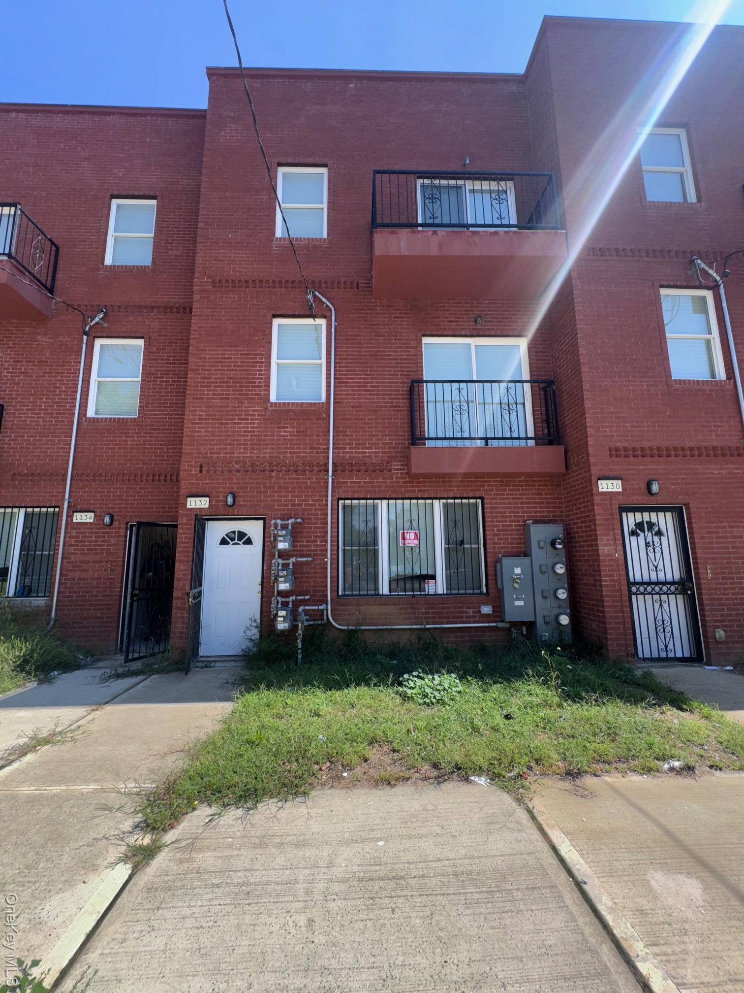 DON'T MISS THIS EXTRA LARGE FULLY RENOVATED BRICK STUCCO 3 FAMILY.