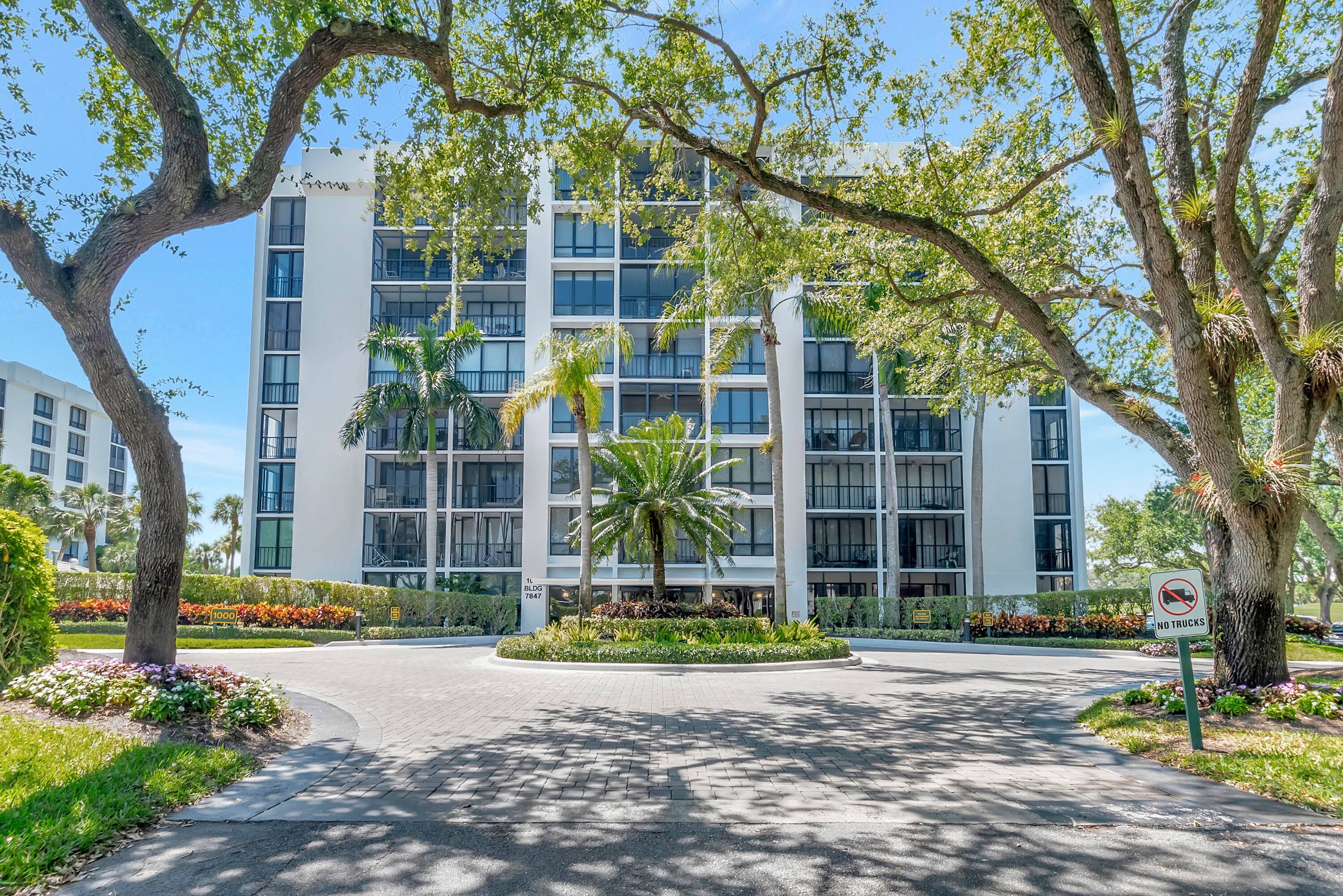 Bright morning sunshine to start your day in this move in ready, ground floor corner unit, with updated kitchen cabinets and appliances.