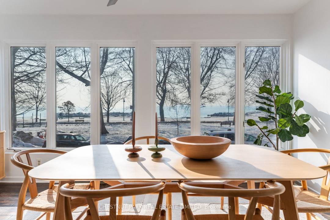 Hubba Hubbard ! Imagine a duplex with unobstructed views across the park to the lake.