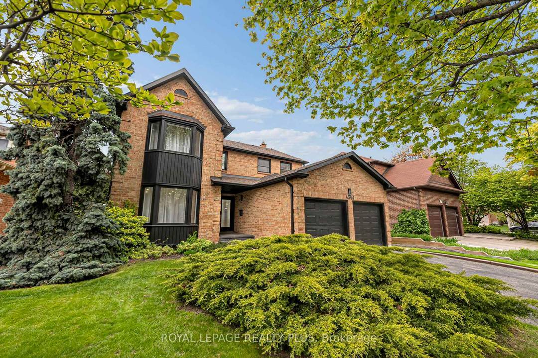 Nestled in a prestigious cul de sac, this stunning home boasts a grand entrance, 9.