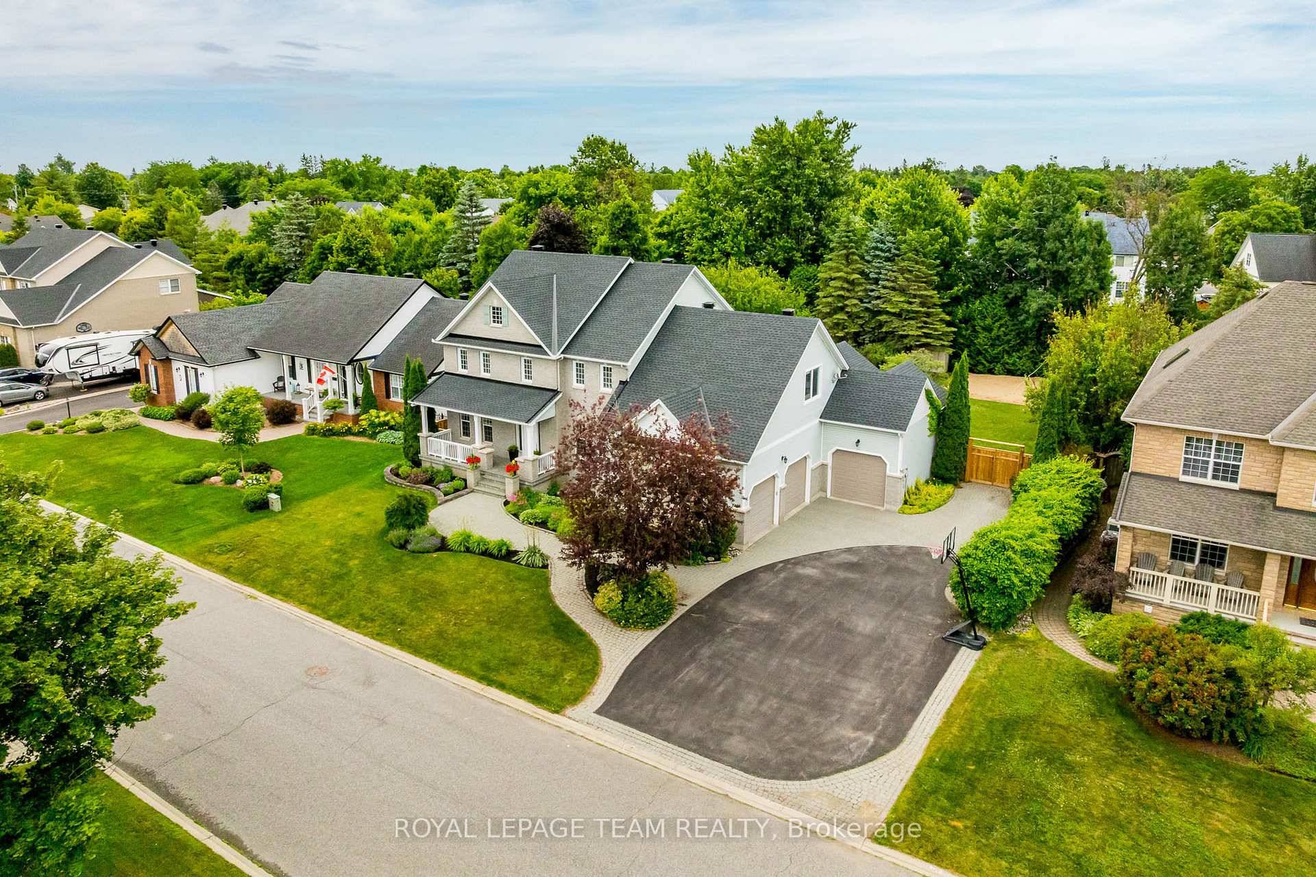 Nestled on one of Stittsville's most coveted streets, this distinguished estate home showcases timeless elegance and unmatched curb appeal.