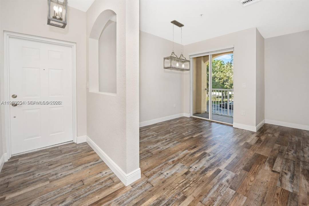 Impeccably remodeled 2 story townhouse style condo at Courtyards at Nautica.