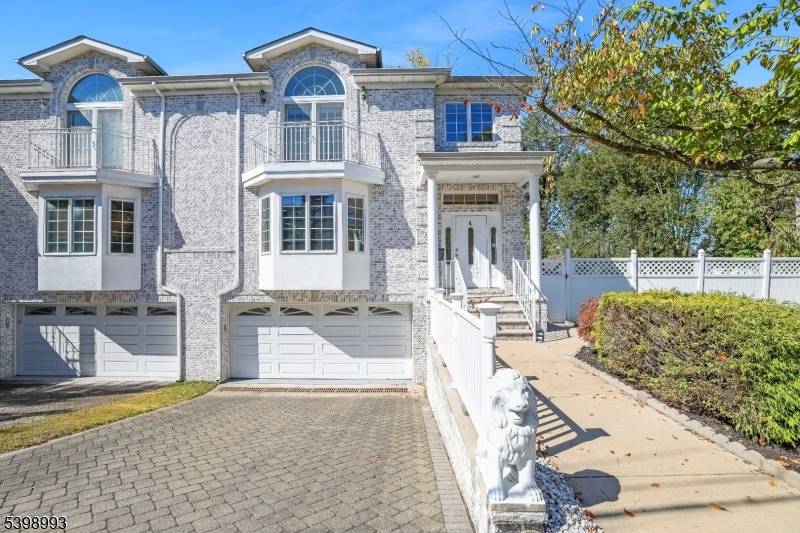 Welcome to 4 Maple Ave., a stunning white brick duplex offering luxurious townhouse condo living without the maintenance fees, by laws, etc.