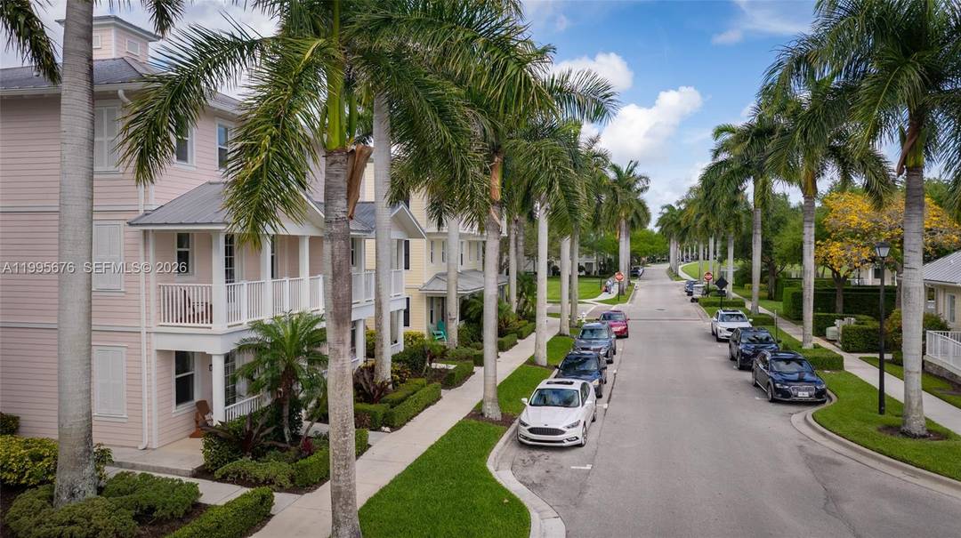 Rarely available live work townhouse in prime Abacoa location directly across from the amenity center pool, fitness, social spaces.