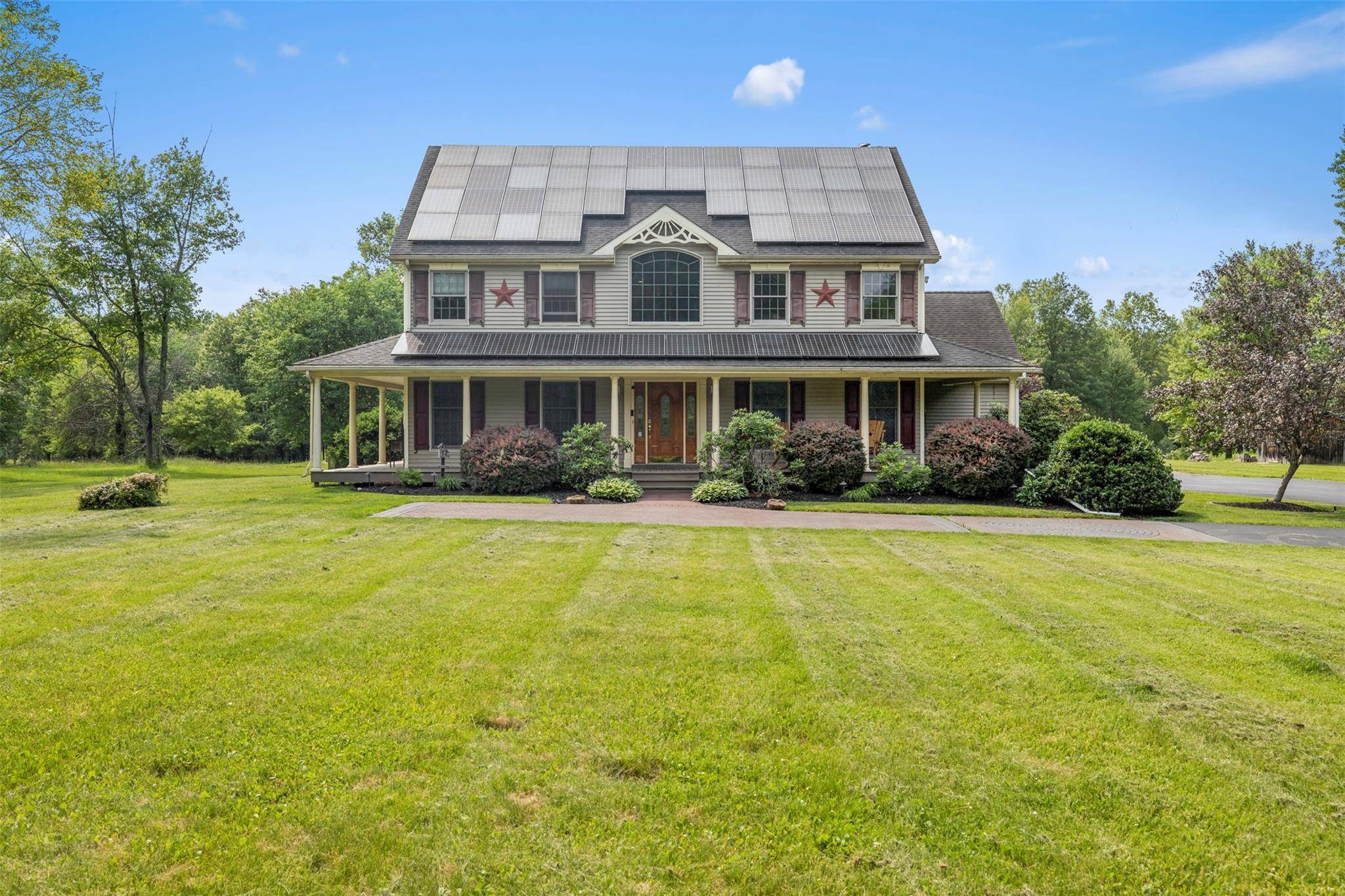 Welcome to 1252 Albany Post Road in Gardiner, New York an exceptional custom Colonial home set on 4.