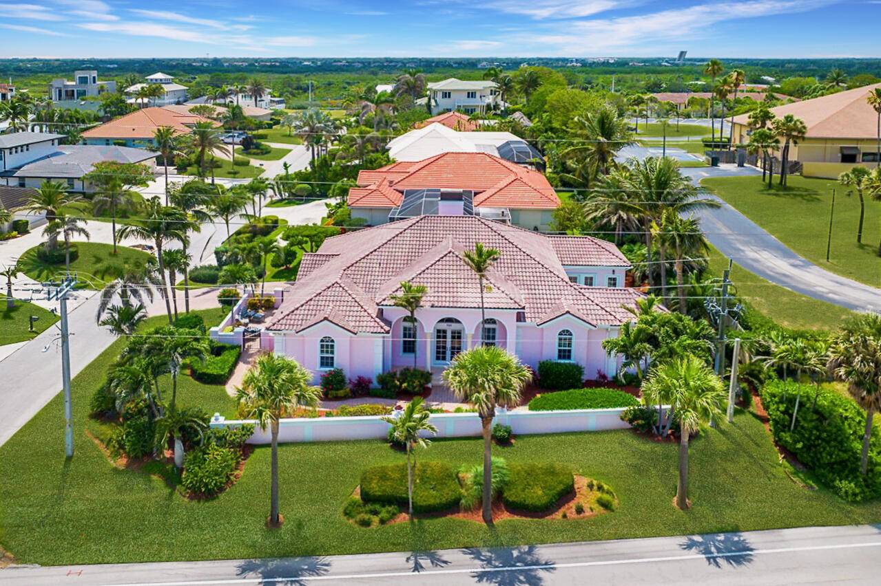 Introducing 705 Ocean Drive, a captivating beachfront property in the prestigious Juno Beach community.