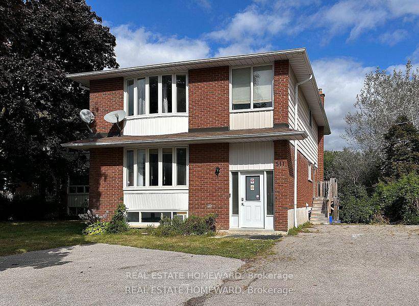 Sunny, high Ceiling basement with a walkout to private yard.