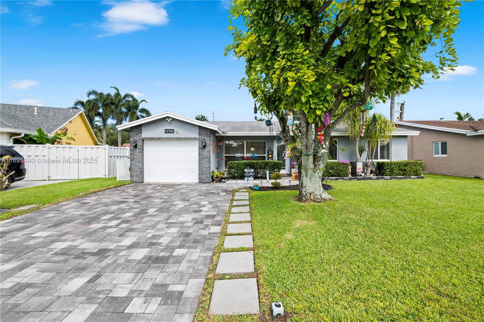 Located in west Sunrise just minutes from the Sawgrass Expressway amp ; with no HOA, this 1 story home features 3 bedrooms, w an extra room off the primary bedroom, ...